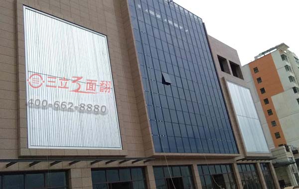 重慶市大足商場裙樓立面外墻三面翻廣告牌案例施工圖片